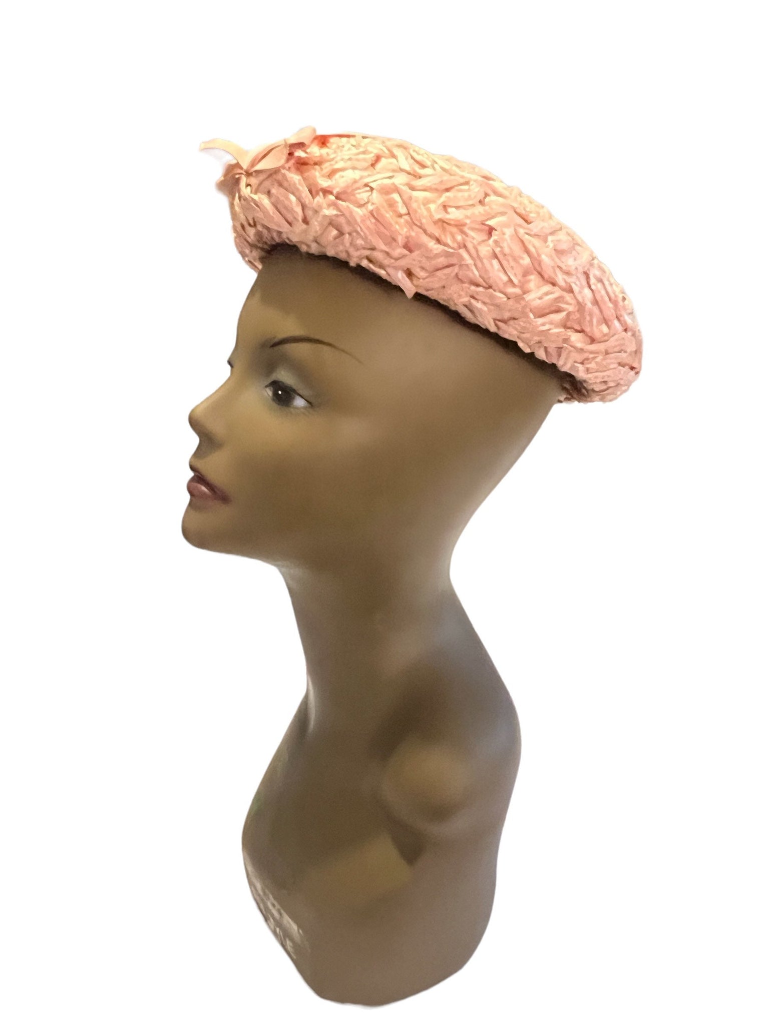 Vintage 60's pink hat with bow decor on front