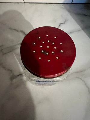 Vintage red Dutch sugar shaker