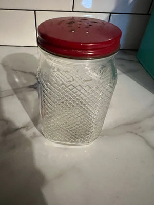 Vintage red Dutch sugar shaker