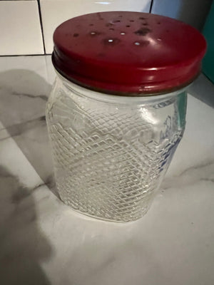 Vintage red Dutch sugar shaker