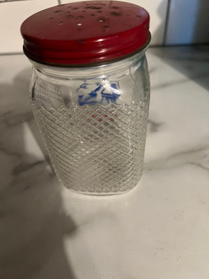 Vintage red Dutch sugar shaker